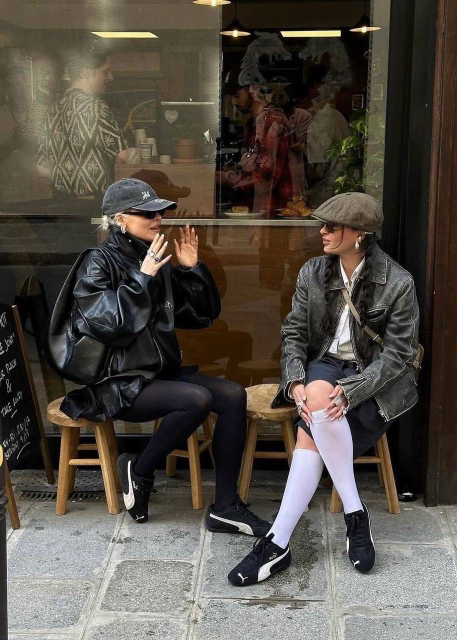 Ascobar street style campaign: two women wearing sneakers at a cafe